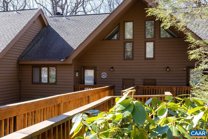 This is a beautifully renovated two bedroom property in the desirable Laurelwood complex.  It is an easy walk to the Mountain Village and slopes.  This unit features a great location with excellent privacy and easy access to the Laurelwood pool.  Many recent updates that include renovated bathrooms, granite countertops, LVP, ceramic tile, fresh decking and a new hot water heater.  This property is turnkey and ready to go for personal enjoyment or rentals.  Make this your jumping off point to enjoy all that Wintergreen and the surrounding area offer.,Granite Counter,Wood Cabinets,Fireplace in Living Room