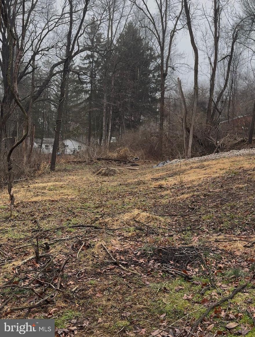 South Eastern School District and the chance to build a brand-new, customizable home for under $330K. Opportunities like this are hard to find, especially with permits already in place and a builder ready to go. This homesite in Susquehanna Trails offers the ability to build with Sherman Builders, giving buyers the flexibility to customize, build to budget, or choose from available models without the stress of starting from scratch.
The price shown reflects the Cape Cod model starting at $328,867, featuring 3 bedrooms, 2.5 baths, main-level primary suite, and full basement with bath rough-in for future finished space, in-law potential, and/or recreation area. Buyers may also choose the Delta Dawn Rancher model OR work directly with the builder to design a home that fits your needs and lifestyle.
Enjoy the natural setting with mature trees, privacy, and the peaceful sound of nearby Neill Run, creating the perfect backdrop for your future deck and outdoor space.
Major improvements already completed including 175 foot drilled well producing 10 gallons per minute, approved sand mound Septic Permit, and Building Permit in hand. Standard features include granite countertops, stainless steel appliances, 50-year dimensional shingles, 10-year structural warranty, and 1-year builder warranty with labor included, offering the peace of mind that comes with all brand-new systems and construction built to today’s standards.
New construction, customization, and South Eastern School District at this price point is becoming harder to find.  Break ground on your brand new home today! 
Plans and specifications available in documents.
