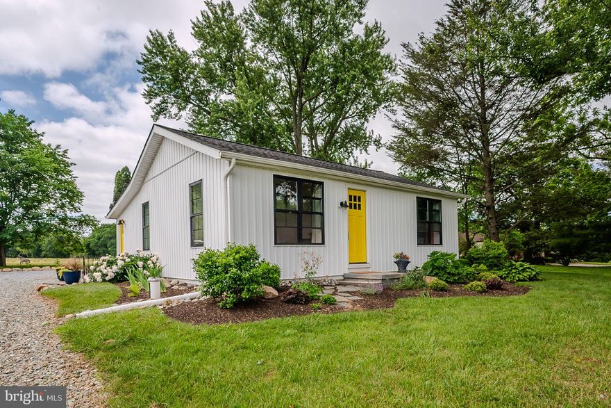 OPEN HOUSE CANCELLED DUE TO SELLER ACCEPTING AN OFFER.This modernized 1950’s ranch is straight out of a magazine.  Renovated from top to bottom in 2021 to incorporate a seamless combination of contemporary and rustic.  Every detail, every fixture, carefully selected to evoke a sense of calm and unmistakable connection to the natural beauty surrounding this home. Yellow pine floors extend throughout the beautiful open living space joining the living room and kitchen, for a comfortable and soothing daily routine.  The corner living room has lovely natural light and convenient desk nook.  The sleek white kitchen features stainless steel appliances, contemporary hood, quartz countertops, charming open shelving, abundant cabinetry with floor-to-ceiling pantry, and a perfect window seat with a view! Step out to the back porch/sunroom to dine with gorgeous views through a wall of windows, heated floors, and a convenient custom storage cubby as you enter from outside. Down the hall from the kitchen you will find the stunning primary bedroom with custom accent wall and inset shelf, expanded custom closet/dressing room, and a full bath with double quartz vanity and heated floors. A refurbished barn door leads downstairs to the lower level with another beautiful living space accented by exposed beams and accent wall.  Also on this level, the second private flex room, used as a bedroom, adjacent full bathroom and under-stair closet, and laundry. In addition to the countless newer interior features, there are a substantial number of major system upgrades including: newer exterior, roof, siding, black windows, HVAC, water softener with UV light system, French drain and sump pump, whole house surge protector, and tankless water heater.  Outside, you will find established garden beds ready to grow your vegetables and spices, as well as an outdoor shed for storage. Situated on .55 acres surrounded by farmland, yet close to everything this area has to offer, Routes 896 and Route 1 for commuting, and within Avon Grove School District. This home is an absolute gem!  Be sure to schedule a showing today!