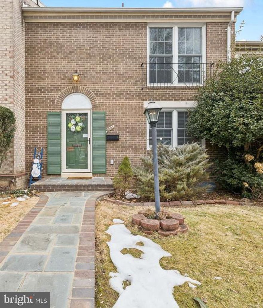 Charming, All-brick townhome nestled in the quaint Cambridge Station community of Fairfax City.  *Assumable  VA Loan with a 2.25% interest rate! This centrally located home is just about 2 miles from the Vienna Metro and within walking distance to restaurants, shops, and multiple parks.  Freshly painted and gleaming hardwood floors span the upper two levels. Beautiful kitchen featuring stainless steel appliances, a gas range, granite countertops, and exceptional storage with a walk-in pantry.  The inviting living room showcases recessed lighting and a charming arched opening to the dining room. Bathrooms on every level add modern comfort. The spacious primary suite includes double sinks and two closets. The lower level offers a generous Family room—perfect for movie nights! Along with a guest bath, an additional walk-in closet, and a laundry area with new washer and dryer and ample storage. Step outside to a fenced rear yard with a large flagstone patio, ideal for outdoor entertaining. Enjoy an assigned parking space plus ample street parking, and easy access to a nearby playground, basketball court, fitness trails, and Stafford Drive Park with soccer fields and a large playground just a few blocks away.  Recent Updates: Freshly painted (2026), Furnace (2024), Washer & Dryer (2024), Dishwasher & Microwave (2025), Fence (2025), Hot Water Heater (2020), French Doors (2019), Flagstone Patio, and Brick and Flagstone Front Walkway (2019).