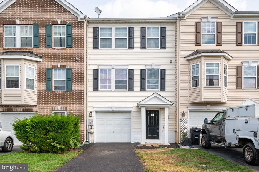 This 4 bedroom, 3.5 bath townhome sits in the much sought after Manor Park. It has just been renovated and is ready for you! A large, paved driveway leads to your 1 car attached garage. Inside you have a welcoming foyer with LVP floors and a large guest closet for awesome storage.  This is where your garage access is. Down the hall you have a full bath with LVP floors, single bowl vanity, and tub/shower. Beyond that is the lower level bedroom with carpet and ceiling fan. It includes access to the rear yard. Finally, you have a laundry room with wire shelving for plenty of storage. The closet keeps your front load, stacked machines tucked out of view. Upstairs you have a large living room with bright windows and LVP. You have a convenient 1/2 bath with pedestal sink. The spacious kitchen features LVP floors, white shaker style cabinets and granite countertops. All appliances are new, stainless-steel. You also have a stainless-steel farm sink. The island provides extra storage and prep space as well as breakfast bar seating for two. There is a large pantry for any other storage needs you may have. The kitchen is open to the dining room and morning room. LVP floors carry into both rooms. The dining room includes chair rail molding and overhead light. The spacious morning room includes access to your rear deck. This is a great place to soak up the sun or host a BBQ. Upstairs your hallway features LVP floors. Bedrooms 1 and 2 are carpeted with bright windows and ceiling fans. The hall bath features LVP floors, single bowl extended vanity, and tub/shower. The primary suite features tons of natural light. You have carpet and a ceiling fan. The space is topped off with a walk-in closet, no fighting over space here. The private ensuite features LVP floors and a double bowl vanity. The soaking tub features tile surround. You have a corner shower with tile surround. Outside the home you have a nice patio outside the lower-level bedroom. The rear yard is level and could easily be fenced. This home has been fully redone and is ready for you. Call for your showing today!