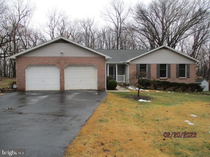 This is a must see! Don't let this beautiful rancher in Roxbury Hills pass you by. This immaculate home is situated on 2.3 acres in a cul de sac that backs to mature trees and woods. You could be enjoying your coffee on the back deck or inside looking out at the relaxing view from the large windows in the beautiful open great room with vaulted ceilings and hard wood floors located just off the kitchen. Speaking of the kitchen, large kitchen area with tons of counter space that opens into that fantastic great room with wood burning fireplace. This home does not disappoint with 4 bedrooms and two and a half baths on the main level.  Additional dining room and breakfast area with built in seating and more windows to take in the peaceful surroundings all in just under 2500Sf on main level alone. The lower level offers lots of space to be creative and make more finished living space. Lots of details in this home that make it a must see to appreciate, not just your typical rancher. New HVAC installed this year. Professional pics to come soon!