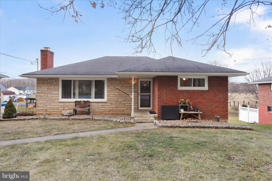 UPDATED & AFFORDABLE FORT ASHBY RANCHER! Welcome to 643 Dans Run Road! This well-maintained stone and brick rancher has been thoughtfully renovated and is move-in ready. The main level offers a comfortable living room (currently used as a formal dining room), a kitchen with freshly painted cabinets and upgraded countertops, three bedrooms, and a full bathroom. Brand-new flooring runs throughout the main living spaces. The lower level features a spacious recreation room, a second full bathroom, a laundry area, and an oversized one-car garage with ample storage. Outside, enjoy the deck overlooking the backyard, along with a newer shed equipped with a garage door for easy access. Recent improvements include replacement windows, HVAC system, gutters, soffit, and more. A solid, updated home at an affordable price—call today for more information!