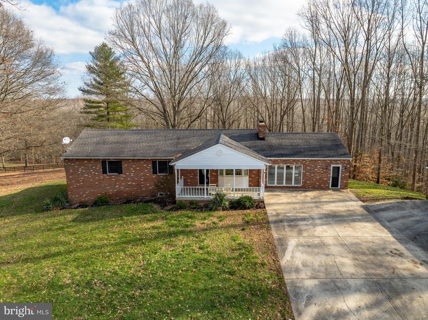 **We have received multiple offers and are asking for best and final offers to be received no later than 5pm on Monday, January 29. A decision will come out Monday evening.**

Welcome Home! This property is located in Waldorf, but feels like you are in a country setting. Situated off of a long private drive, this property sits on 4.83 acres. 5 bedrooms and 3 baths total! 3 bedrooms and 2 baths on the main floor.  A large den with access to a back deck sits directly off of the dining room. In addition, there is a sunroom for you to enjoy your morning coffee. The second floor is set up as an in-law suite, with another kitchen, laundry, living room, bar, full bath, and 2 bedrooms. The property has a detached two-car garage with a storage bunker underneath. In addition, there is a separate detached garage with carport and sunroom. There is plenty to love about this property and plenty of privacy for you and your family to enjoy all it has to offer!
