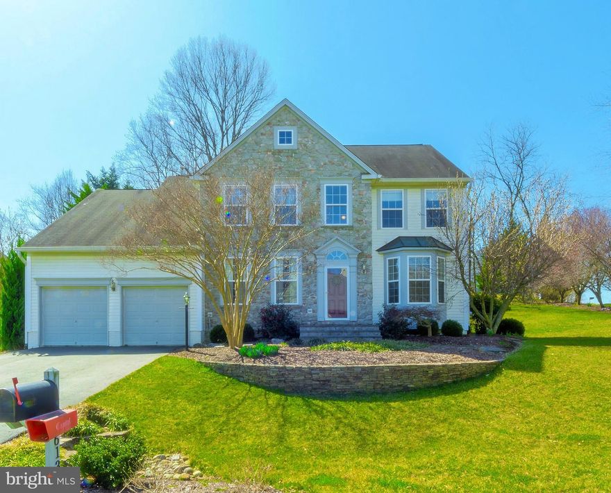 Gorgeous home with the "Wow" Factor!  Beautiful new granite counters, hardwood floors,  open and bright floor plan, 5 bedrooms & 3.5 baths, improved lower level, 2-car garage, all sited on over 1/2 including deck, playground equipment, new awning and desirable corner lot in cul-de-sac and so close to every major thoroughfare, shopping, restaurants, and entertainment as well as Downtown Annapolis!  Very peaceful and sought-after community.  Hurry...this will fly off the market!