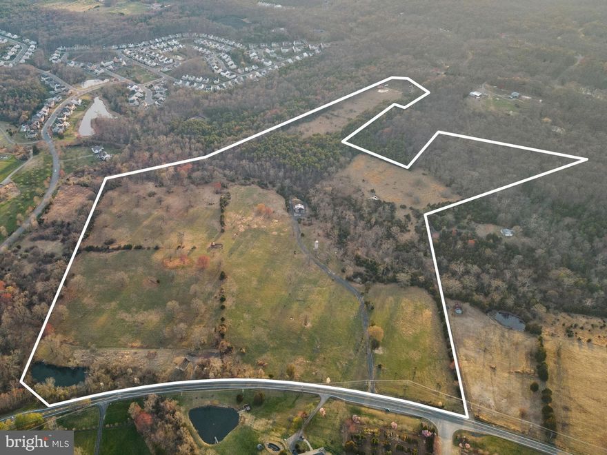 This stunning 68+/- acre property located in the highly desirable Evergreen Mills Rd location of Loudoun County offers an exceptional investment opportunity.  The property comprises of three spacious lots, both wooded and cleared with a pond adding to the property's natural beauty.  Zoned AR1 this property offers a wide range of possibilities for development.   The location is perfect with approximately 1/3 mile of Evergreen Mills road frontage and easy access to the Toll Rd, major highways and all the amenities that Loudoun County has to offer.  Along with the direct access there is a 30' right of way easement along a neighboring  property providing more access options to the back 14 acres.