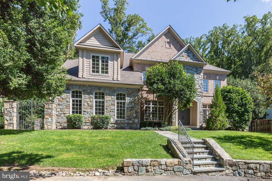 New price! Impressive 7,500+ SF colonial on private landscaped 1/2 acre lot in desirable Bradley Hills Grove.5 bedroom, 5 full baths & 3 half bath w/ dramatic center hall foyer, 2 staircases, gourmet kitchen w/ breakfast room, open family room, library/office, lower level w/ media room & au-paire suite. Oversized master suite, floor to ceiling windows, 10 ft ceilings, 3 car garage & pool!