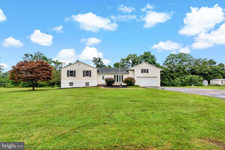Step into this beautifully updated 4-bedroom, 2-bathroom home that combines comfort, space, and modern upgrades. Freshly painted throughout with brand-new flooring, this home is move-in ready and full of charm. The spacious living and dining areas flow seamlessly into a modern kitchen with ample storage and natural light.  A fully finished basement provides flexible space for a family room, home office, or gym—endless possibilities! The attached garage offers convenient indoor access and extra storage. Outside, enjoy a sizable backyard perfect for relaxing or entertaining.