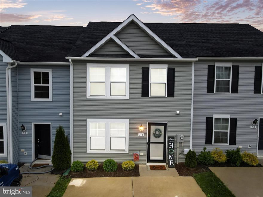 "Archers Rock" sounds like a dream! A modern townhome with all the amenities one could wish for. The large eat-in kitchen with its spacious center island is perfect for family meals or entertaining guests. Stainless steel appliances, including a gas range, add a touch of sophistication to the cooking experience.
The open floor plan seamlessly connects the kitchen to the generously sized living room, creating a welcoming atmosphere for gatherings and relaxation. Upstairs, the primary suite with a full bath offers privacy and comfort, while two additional bedrooms and another full bath provide ample space for family or guests.  The laundry area is located on the second floor.
Outside, the concrete driveway ensures easy parking for two cars, and the fenced in level backyard with no neighboring townhomes behind it promises tranquility and privacy. With quick access to I-81, commuting is a breeze, and the nearby local breweries, distilleries, and farm markets offer opportunities for leisure and enjoyment.
Whether you're a first-time homebuyer, a growing family, or looking for a comfortable retreat, "Archers Rock" has something for everyone. Don't miss out on the chance to make this move-in ready gem your new home! Schedule your tour today and experience the charm and convenience for yourself.