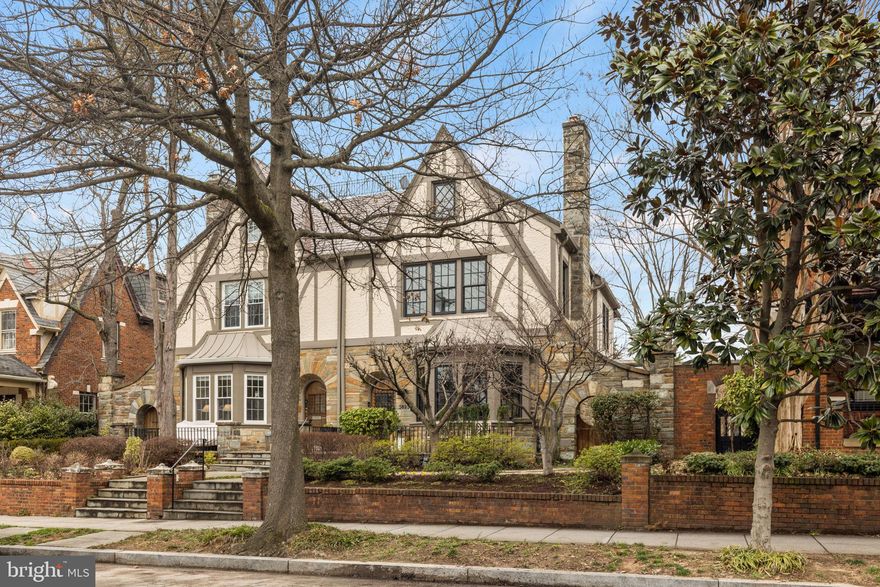 Experience the epitome of elegance at 3823 Cathedral Ave NW, where classic Tudor charm meets modern luxury in prestigious Cathedral Heights. This south-facing residence boasts four meticulously redesigned levels, showcasing exquisite architectural details and superior craftsmanship throughout. Recently renovated to perfection, this home features 4 spacious bedrooms, 4.5 luxurious bathrooms, and an open-concept main level ideal for seamless entertaining. The gourmet kitchen is a culinary masterpiece, appointed with top-of-the-line Wolf, Bosch, and Sub-zero appliances, complemented by Carrera marble countertops. French doors lead to an expansive outdoor deck, providing a serene setting for al fresco dining and relaxation. The main floor exudes sophistication, with a grand entrance, a stately living room boasting a fireplace with a preserved mantle, and a butler's pantry adorned with custom cabinetry and marble accents. Crown moldings add to the timeless allure, seamlessly blending modern living with historical charm. Retreat to the upper level, where the sprawling master suite awaits, complete with a private dressing area, a spa-like bathroom, and a separate sitting room. A second bedroom offers marble en-suite luxury and picturesque views of Cathedral Heights.
The finished fourth level presents a versatile space, perfect for a guest suite or home office, complete with a marble-topped wet bar and access to two roof decks with breathtaking views of the Cathedral and city skyline. The lower level is an entertainer's dream, featuring a separate au-pair/in-law suite with a full kitchen, family room with fireplace, and access to a charming Flagstone terrace. Ample storage space and a laundry room provide added convenience. Situated near the National Cathedral, Cathedral Commons, Cleveland Park, Georgetown and an array of dining and shopping options, this home offers the ultimate blend of tranquility and convenience. Easy access to major thoroughfares, Reagan National Airport and nearby attractions make city living a breeze. Indulge in luxury living at its finest – Welcome Home!