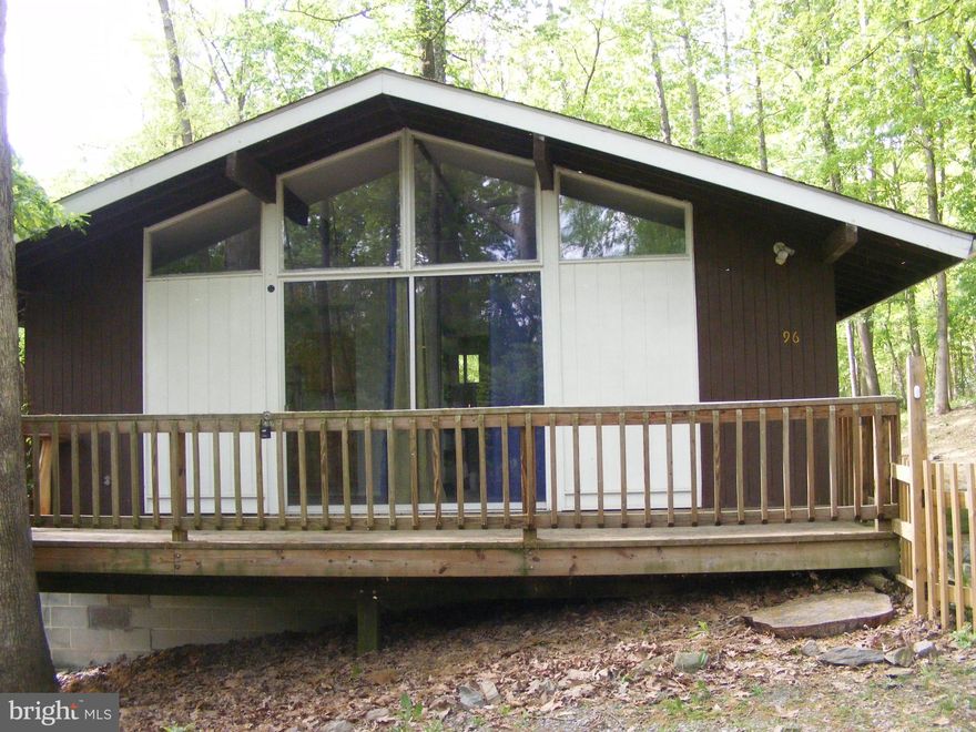 Beautiful chalet situated on a wooded lot located in Shannondale,and only a short distance to Lake Shannondale. Cathedral ceiling and exposed beams add charm to this home, the combo kitchen dining area that opens to the deck through a sliding glass door will be the perfect spot for your morning coffee. How about the fire pit in the back for evening bonfires with family and friends. This turn key property was remodeled in 2019. Located close to the VA/WV state line this property will allow for a quick getaway from the hustle and bustle of everyday life. You don’t want to miss out on this gem!