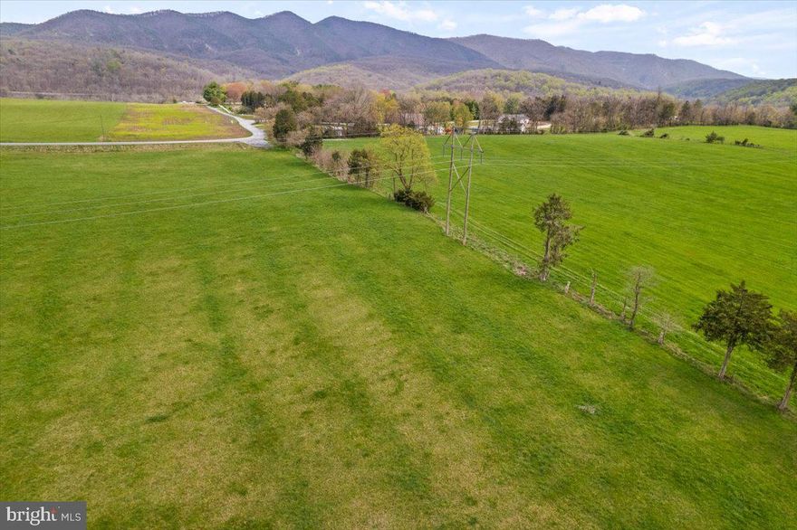 THE BEST VIEWS!!!Just under 14 acres of the American Dream! Panoramic views in all directions, the view that everyone envisions their dream home having. Plenty of room for seclusion, cattle, horses or a great garden! Bring your house plans and get ready to fall in love! No better place to settle down than the Shenandoah Valley, surrounded by pasture views, and just minutes from the River, The national forest and town!