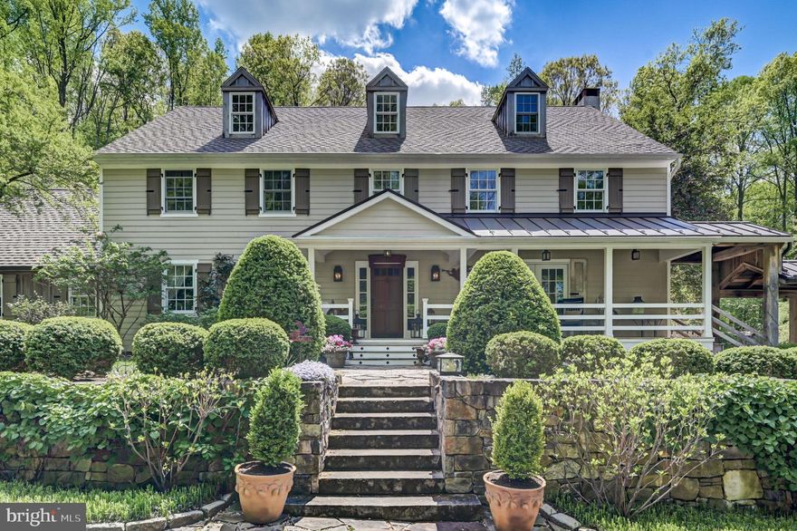 Welcome to 2099 Bodine Road in Malvern. This lovely home is  on a private picturesque , park like setting   2.3 acres. Nestled at the end of a long drive,  elegance blends w/ charm. From the circular driveway to the hansdsome stone walkway and entrance stairs inviting you up to a covered front porch.    Welcome  into the classic foyer and embrace the  exquisite craftmanship throughout.  The farm house style updates are very unique & give this home a very stately appeal. Beautiful gleaming Carlisle wide plank hardwood flooring   Crown moldings, beadboard, and recessed lighting, are just a few of the upgrades for the discernng buyer. The living room/ library features French doors  & an abundance of built in shelving. There is access to the lovely front porch throug the Pella French doors. The spacious yet cozy  family room with stone fireplace and reclaimed barn mantel piece, opens to a lovely updated kitchen with Limestone counter tops, AGA stove,  commercial grade appliances. farm sink, kitchen Island  with pendant lighting and cute built in  breakfast nook surrounded by windows.  The kitchen door leads to the back yard  a resort style  outdoor oasis. Enjoy your morning cup of coffee, during the fall and winter months light the stone built in fire place, w/mounted TV to enjoy your favorite programs. The grill is built in. This outdoor haven  also has breathtaking stone work and and cozy firepit. The propety boasts an abundance of mature perenials. & lush gardens surroundng every view.  This al fresco bucolic setting perfect for entertaining .
 Come back in through the mud room adorned with a fancy brick floor & built in shelving. The laundry equiped w/ new washer & dryer plus utility sink. The nuetral pallete throughout compliments the comfort of this home. The formal  dining room has an arched buffet serving area,  bright and cheery abundace of natural lighting. The expansive great room addition boasts a catherdral  beamed ceiling,  reclaimed sliding barn doors, a wood burning  Franklin stove , featuring a reclaimed wood wall. French doors wich lead to a stone patio,   To set the mood for any occasion,  the living room,  great room, kitchen area & outside patio areas are all complemented by a sound system.

The upstairs primary suite, has a catherdral ceiling with beams, spacious organized walk in closets. Relax in your spa like  bathroom w, claw foot  soaking tub, radiant heated floors, stall shower, on demand hot water, marble vanity, linen closet and limestone flooring.   This level also has  two  spacious bedrooms with additional updated bath with white penny round tile, beadboard, double porcelain antique sinks & linen closet. The large hall study center completes this level. The third floor has a huge bedroom with dormers  and storage attic. There is a  built in two zoned HVAC system & generator for main house and for garage / office / flex space.

The beautiful stone walkway and covered breezeway are just steps away from the main house.
Behold an amazing bonus structure a huge garage / office sructure  3,200 SF w/ intricate stone work and wood work.  there are 10 bays for the collector , a water bay to spa detail your collectables.
Upstairs is a huge beamed office area complete with shelving and hardwood flooring, recessed lighting and five windowed dormers providing an abundance of natural lighting.
This property is next to the McDevitt trail which is  a beautiful conservancy w/ a lake and riding trail. Close proximity to many equine farms along with the Phelps School, Malvern Prep,  Great Valley Schools, 202 , I 95 & PA turnpike, 476, Phila International Airport, Valley Forge National Park, King of Prussia Shopping Mall.  Just minutes  to the Historical Borough of Malvern  with  unique shops and  fine dining restaurants. Bodine Manor  is a rare and unique find,   This  home has been lovingly cared for and greatly enjoyed for many years by its current owner. Truly a car enthusiast's dream.  Huge  Home office & flex sp