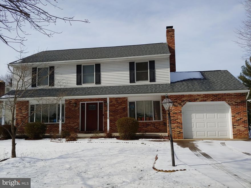 THE APPEAL DOESN'T STOP AT THE CURB. ONCE YOU ENTER THRU THE BEAUTIFUL FRONT DOOR OF THIS PORCH FRONT COLONIAL, YOU'LL BE GREETED BY A LARGE FOYER, WHERE THE CERAMIC TILED FLOORS WILL LEAD YOU DOWN THE HALL TO THE LARGE, UPDATED, EAT-IN KITCHEN, LOCATED IN THE REAR OF THE HOUSE. GLEAMING HARDWOOD FLOORS GRACE THE LIVING ROOM, DINING ROOM & FAMILY ROOM. LIVING ROOM & FAMILY ROOM OFFER HUGE BAY WINDOWS, BOTH WITH PLANT SHELVES. ATRIUM DOOR, IN THE FAMILY ROOM, LEADS TO THE REAR DECK & YARD.  GORGEOUS, REMODELED BATHROOMS, RECENT ROOF & HVAC. RECETLY INSTALLED CARPETING ON STAIRS & UPPER LEVEL. MULTITUDE OF CEILING FANS & RECESSED LIGHTING. BASEMENT IS AN ENTERTAINER'S DREAM, COMPLETE WITH KITCHETTE, FULL BATH & A BONUS ROOM, TO USE FOR GUESTS, OFFICE, PLAYROOM, ETC. AN EXTRA PLUS ARE SOLAR PANELS TO REDUCE YOUR HEATING EXPENSE. WALK TO TOWN TO ENJOY MANY FESTIVALS, PARADES, FARMER'S MARKET, BOUTIQUE SHOPS, DINING, WORSHIP, ETC. HOUSE IS IN "TURN KEY", MOVE-IN CONDITION, FOR YOU.