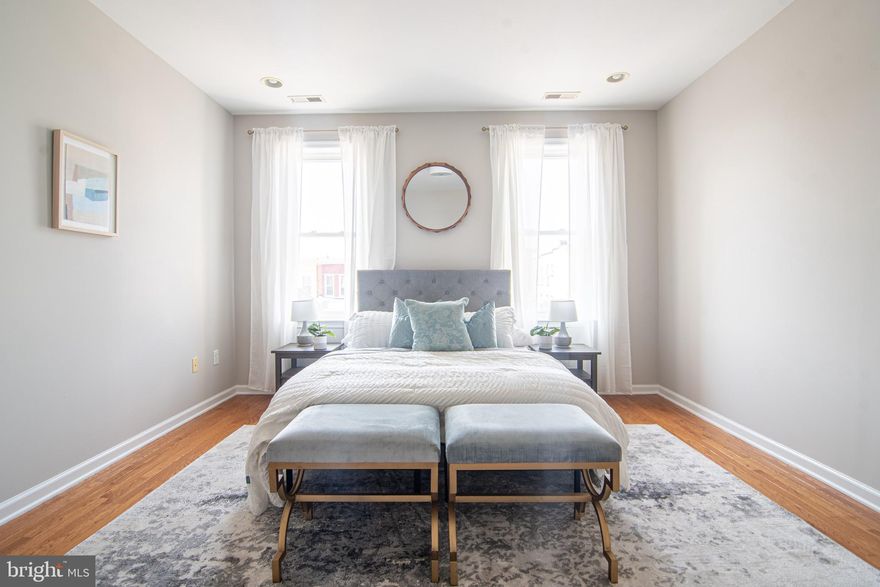 Get started on owning a property with this 2-bedroom townhouse, conveniently located between JHU, Loyola, and Morgan State.

This home is well-maintained and boasts timeless design details such as hardwood floors with no carpets and floor-to-ceiling windows that flood the space with natural light. The bathrooms have been updated with tile and modern fixtures, and the neutral color palette is a beautiful touch.

The kitchen has been upgraded with new stone countertops, stainless steel GE appliances, and pendant lights above the breakfast bar. You can enjoy grilling dinner on the private back deck just off the kitchen during summer evenings.

Upstairs are two bedrooms, one full bathroom, and a laundry area. The primary bedroom features a walk-in closet and tons of natural light.  The hall bath features a new vanity, a bright LED ceiling fixture, and a built-in Bluetooth speaker. The second bedroom can be utilized as a home office or rented out to assist with mortgage payments. 

This home stands out from others on the market with its unique features, such as a well-maintained basement equipped with two sump pumps and a drainage system, central air conditioning, and smart-home technology, including a Ring doorbell and Ecobee thermostat.

Come live in the vibrant Wilson Park neighborhood that offers convenient access to public transportation and Willow Avenue Park. Miss Shirley’s, a famous local eatery, is just a 5-minute walk from your doorstep. With easy access to universities, shopping, and downtown, this neighborhood has it all.