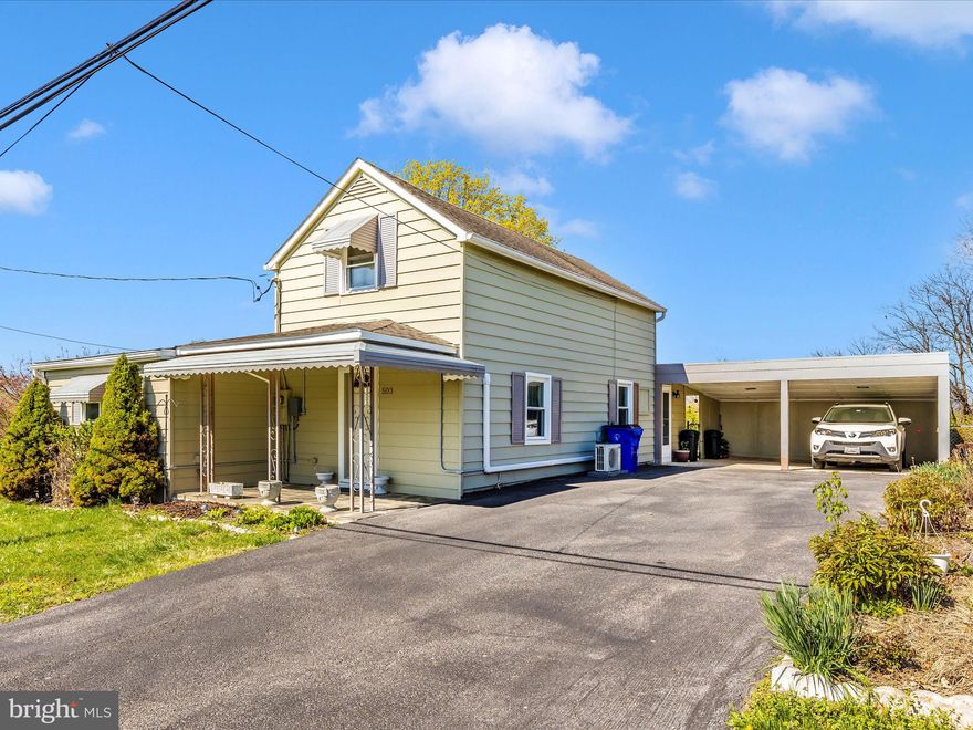 Don't miss the chance to spread out on this large corner lot with scenic views.  This home has 3 bedrooms and 2 full baths.  The home has a first floor bedroom and a full bath.  Hardwood floors throughout.  Over 1800 sq. ft. with 1st floor, living room, dining room, kitchen, bedroom, bath and a family room with a fireplace.  Spacious kitchen with an abundance of cabinets.  Upstairs has 2 bedrooms and a full bath.  Newer washer and dryer that convey.  Split HVAC unit.  Mostly Finished basement with walkout to the outside. Large driveway space and 2 car carport.  The  in-ground swimming pool has not been used for several years but could be a great way to cool off for the summer.  Oversized fence lot is the perfect space for entertaining with paver patio and pool.  Close to library, restaurants, commuter routes, shopping and MARC train.  Hurry! Won't last long!