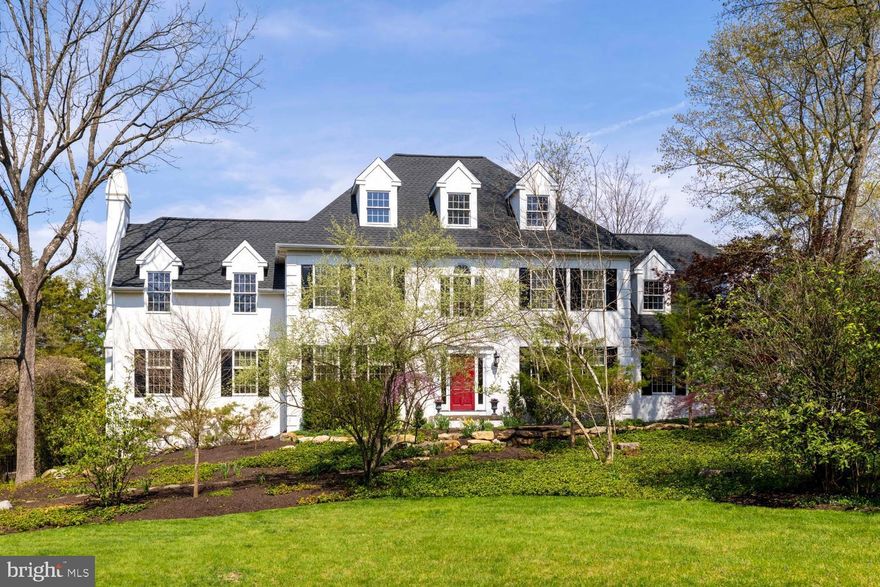 Tucked behind tall trees in New Hope's Kingswoods community is a large, private Colonial on 0.92 landscaped acres. The Zaveta-built floor plan is ideal, with a center entry leading to a formal dining room and a living room/study with a fireplace that could easily serve as a home office. Hardwood floors have been refinished throughout this level. The eat-in kitchen is the heart of the home; from here you can step into the family room and gather by the fire, or you can head out through French doors to the Trex deck overlooking the pool and private yard. Upstairs, the main bedroom suite has both east and west exposures, with a private anteroom that works equally well as an office, workout space, or nursery. There are three additional bedrooms off the center hall, along with a second staircase that lands near the laundry area and three-car garage. The finished lower level includes another private bedroom suite, media/play room, and an open space with sliders out to the pool/hot tub.  A full attic is reached by full-width stairs. All of this is set in a community within walking distance of New Hope's shopping and dining, yet tucked away at the end of a quiet cul-de-sac.