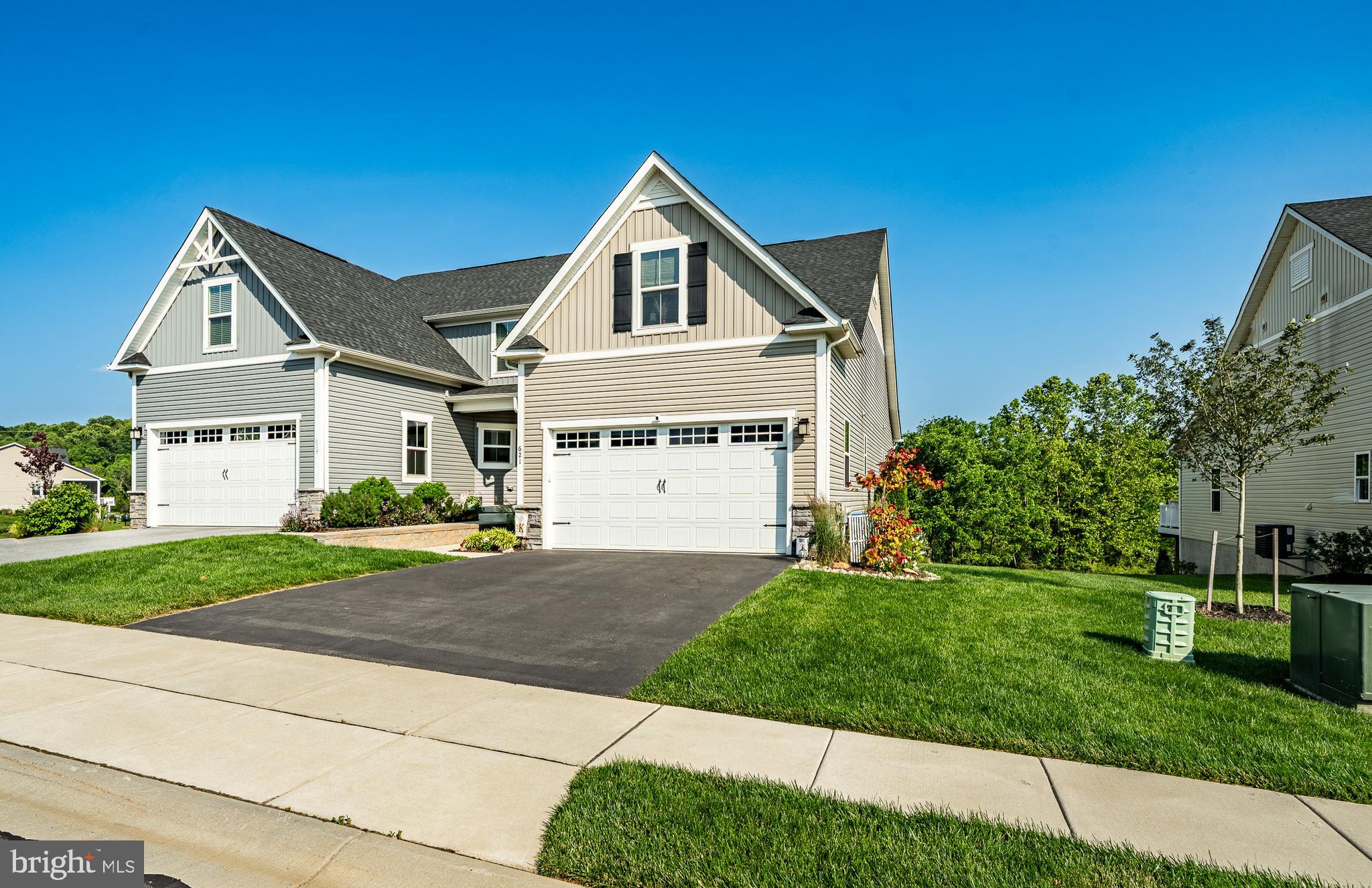 Welcome Home!
Walk into elegance that doesn't quit. Once here you won't want to leave.
621 Thomas Penn Dr. in the 55+ Community of BIG ELK, is a former MODEL HOME featuring multiple upgrades and amenities. This custom townhome boasts 3200 square ft. of living space, carefully designed with all the essentials on the Main Floor - Primary Bedroom Suite w/walk-in Custom California Closet design, Large Primary Bath with double vanity, a main floor Laundry Room, powder room, and state of the art kitchen. The main level smartly features easy to care for Luxury Vinyl Plank flooring.
An open-concept floor plan easily flows from the ample dining area, perfect for gatherings, both large and small, and joins seamlessly into an equally spacious and over-sized living area and sunroom. Meal prep will be a breeze in the state of the art kitchen, with ample countertops, beautiful white cabinetry with custom pantry closet and an island; the perfect place for morning coffee. If you prefer morning coffee on the deck, this one does not disappoint. Custom vinyl, maintenance free decking, custom awning, and backing to open space ensures privacy and a bit of birdsong. Of course, if you're a fan of BBQ, just walk down the steps to the large patio. with its beautiful custom hardscaping and in-ground irrigation system. Directly off the patio you'll enter sliders to the FULLY-FINISHED lower level. Your eyes aren't deceiving you in the photos - this level is large! The current owners use it to accommodate a full-sized pool table, baby grand piano, dining table w/four chairs, and tv lounge area!
Guests or family coming to visit? No worries! The second level offers two large bedrooms, a full bath, and closets galore.
This is a one-of-a-kind, impeccably cared for property. Truly Move-in ready, freshly painted, new carpeting on both second and lower levels!
Easy Access to Delaware and Maryland. Nearby shopping - literally just 'down the road'. City amenities with country charm. Minutes to Kennett Square, trendy restaurants, and did I already mention shopping, shopping, and more shopping?
Just bring your toothbrush and call it HOME!