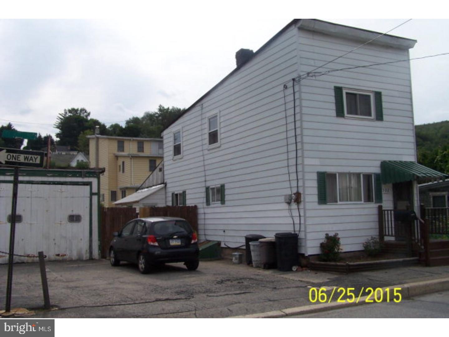 Cozy & clean this Tamaqua single with 1 car garage & OSP Laundry/storage room off kitchen with exterior entrance to patio & fenced yard for summer enjoyment. Comes with range, refrigerator, dishwasher, microwave, washer & dryer. Patio fence opens to off street parking & parcel has 2 lots located down to the corner. Mailing Address Continued: 302 Rolling MIll Ave Color: tan Amp: 100