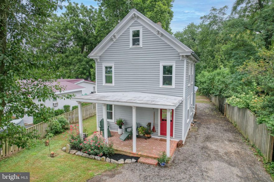 This farmhouse-style home is nestled in the heart of Kennedyville’s rural farmland and combines original character with tasteful upgrades. The property offers 3 bedrooms and 2.5 baths, including a first-floor bedroom with French doors leading to the rear yard.
Inside, you’ll find wide-plank hardwood floors throughout, detailed woodwork, built-ins, and naturally bright rooms. The main level includes a full bath, office, and a foyer with new cabinetry and additional access to the side and rear yards. Upstairs, the second floor provides a bedroom with a large walk-in closet and full bath, while the third floor offers a flexible space that could be used as a bedroom, home gym, library, or craft room.
The outdoor areas are well-suited for both relaxation and activity, with space for gardening, gatherings around a bonfire, or simply enjoying panoramic views of the surrounding farmland. A covered front porch adds to the home’s welcoming appeal.
Recent upgrades by the current owners include all new windows with a transferable warranty, a new water system, new cabinetry in the hall, and a new Thor stove.
Conveniently located, the property is within close proximity to Middletown, Chestertown, and multiple public landings throughout Kent County.