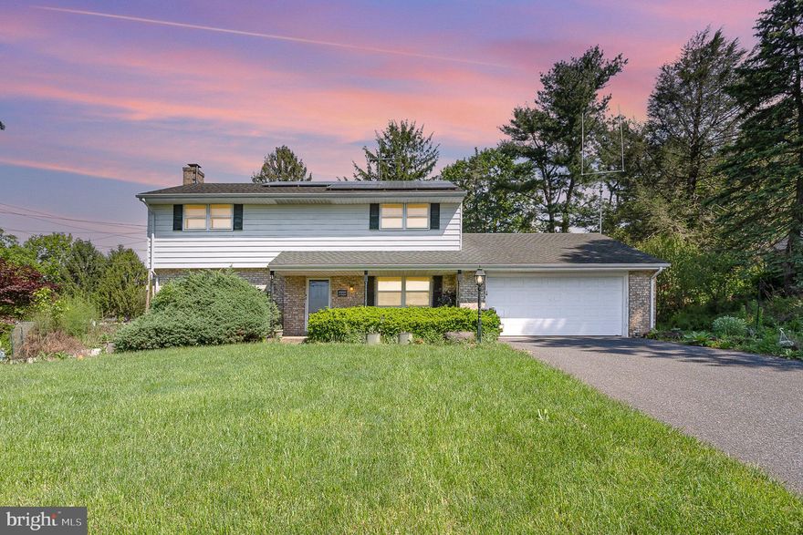 This 3-bedroom, 2.5-bathroom home in the heart of Lower Paxton Township offers a wonderful opportunity to settle into a well-located property full of charm and potential. Situated close to shopping, schools, major highways, and top-rated restaurants, the convenience of this location can’t be beat. Inside, you’ll find hardwood floors throughout the dining room, family room, and all three bedrooms. The kitchen is adjoined to the living room, creating an easy flow for everyday living and entertaining, and a nearby half bathroom adds extra convenience. The sunroom, warmed by a kerosene gravity-feed furnace, provides a cozy bonus space to enjoy year-round. The family room features a classic brick gas fireplace and more hardwood flooring, while the full basement includes laundry hookups and plenty of room for storage or future finishing. Upstairs, the primary bedroom includes a walk-in closet, a second closet, and hardwood floors. Bedrooms two and three also offer hardwood flooring and share access to the main bathroom. Additional highlights include owned solar panels, an oversized two-car garage, and pull-down attic access in both the upstairs hallway and garage. The home is connected to public water and features a private septic system with a new drain field, updated junction box, and riser. Don’t miss your chance to make it your own!