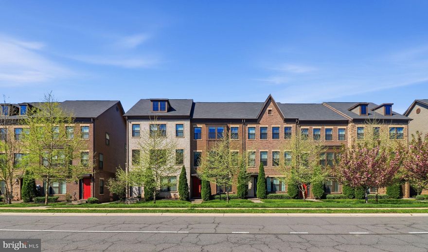 Welcome to this beautifully updated 4-level townhome in the highly desirable Discovery Square community in Herndon! Built in 2018, this move-in ready home offers nearly 2,400 sq ft of modern living space with fresh paint, brand-new carpet, and stylish finishes throughout.
The open-concept main level features a spacious living room with remote-controlled blinds, perfect for entertaining or everyday living. The gourmet kitchen includes quartz countertops, a large center island, oak cabinetry, pantry, and ample dining space—ideal for both formal and casual meals. A convenient half bath completes this level.
Upstairs, the bedroom level offers 3 spacious bedrooms and 2 full bathrooms, including a luxurious primary suite with a walk-in closet, double vanity, and private bath. The additional bedrooms share a full bath, and the upper-level laundry room adds everyday convenience.
The top floor loft with vaulted ceilings is a standout feature—perfect as a home office, media room, or flex space—complete with a wet bar, gas fireplace, half bath, storage room and private terrace.
The lower level includes a large recreation room with potential to convert into a 4th bedroom suite, plus access to the oversized 2-car garage with built-in EV charger—fits two SUVs comfortably.

Additional highlights: 
• Smart home features (Ring front door cam, smart lock ready, smart bulbs in living room)
• Full-house water filtration system
• Whole-house water softener
• Whole-house humidifier
• EV charging setup
• Freshly painted walls throughout
• Custom closets
• Fully setup garage with slat wall, overhead storage, Kids wall climbers, pull up rings and shoe racks
• Ample storage throughout
• Turnkey condition

Prime location near Metro stations, Reston Town Center, Tysons Corner, Dulles Airport, and major commuter routes including Route 28 and the Dulles Toll Road.
Zoned for the sought-after Westfield High School pyramid.
This home offers the perfect combination of space, location, and modern upgrades—schedule your showing today!