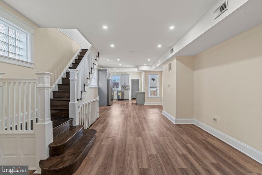 **Charming Renovated 4-Bedroom Home with Modern Touches**  
Welcome to this beautifully renovated four-bedroom, two-full, and one-half-bathroom home that combines modern amenities with timeless charm. This property stands out with three separate entrances, offering flexibility and accessibility for modern living. 

 Step through the inviting vestibule into a bright and airy living space, perfect for entertaining or relaxing.  
The main level boasts an open floor plan with a spacious living room/dining area, and an updated kitchen featuring sleek countertops, stainless steel appliances, and ample cabinet storage.  Upstairs, you’ll find three generously sized bedrooms. The finished basement has a bedroom along with a convenient full bathroom.  Outside, enjoy a private backyard ideal for gatherings or quiet moments. Located in a desirable neighborhood close to schools, parks, and shopping, this home is a must-see!