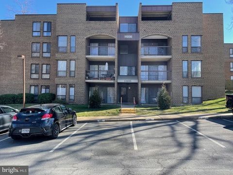 Photo of 11208 Chestnut Grove Square #210, RESTON, VA 20190 (MLS # VAFX2308294)
