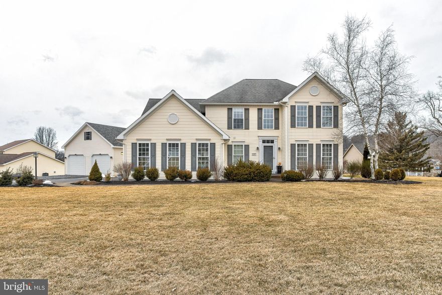 What a Gorgeous home! This stunning DeHass-built house sits on 1.18 acres within the State College Area School District. The completely remodeled open eat-in chef's kitchen w/ brand new everything, including the center island, all stainless appliances – gas cooktop range, quartz countertops, and walk-in pantry. The kitchen is open to the bright and welcoming family room w/gas fireplace and sliders to the entertainment-friendly back deck w/above-ground pool w/ deck surround and fabulous, manicured backyard. The first floor features a formal living room – currently used as an office and a big dining room.  The entire 1st and 2nd floors now have matching custom hardwood floors. The spacious second floor includes a luxurious master suite with a double vanity, walk-in closet, soaking tub, and a newly remodeled tile shower. There are also three additional large bedrooms and a full bath on this level. The finished lower level offers an office, a recreation room with a wet bar and kitchenette, a full bath, and a bonus room.  Attached is a 2-car garage and a new detached 2-car garage with a storage loft.  With panoramic mountainside views, this home is truly a remarkable find!