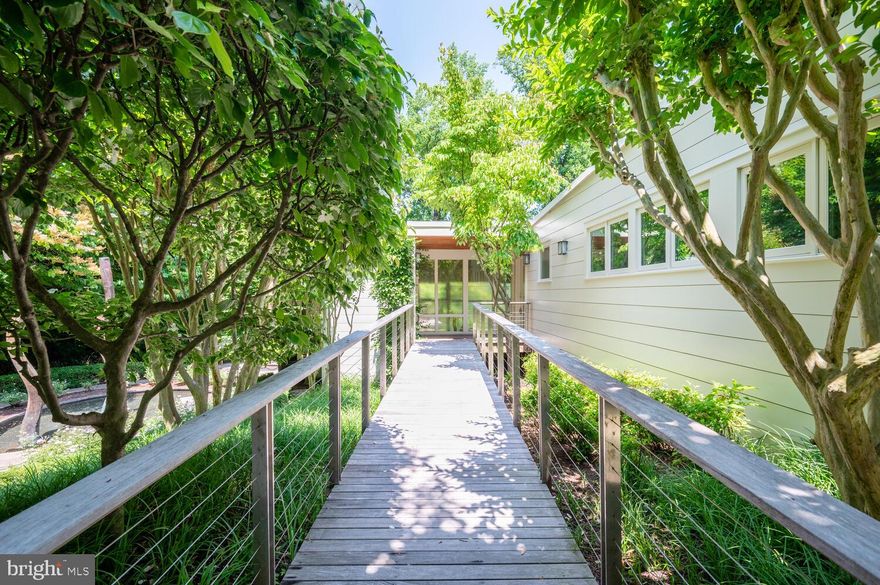 Located just north of Chain Bridge in Arlington at the Arlington & McLean border 3901 44th Street is a unique and special property.  The charming home features three bedrooms, two baths and floor to ceiling glass providing stunning views of the Potomac River and the Palisades of DC.  Creative spaces abound inside and out with exquisite finish details and a private pool overlooking the river.  The site offers an exclusive and exceptional opportunity to build a new residence.  The 34,445 square foot lot (.79 acre) can accommodate an extraordinary home up to approximately nine thousand finished square feet, including a pool, garage parking, and signature views of the Potomac River and beyond.  The location for a new home along with exterior renderings exhibits a vision for a custom residence on this irreplaceable property.