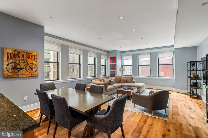 NEW LISTING! Welcome to The Chelsea, Residence 401, a beautifully upgraded corner unit offering three Exposures (North, West and South), soaring ceilings, and oversized windows that floods the interior with streaming natural light. This expansive two bedroom, two-and-a-half-bathroom condo offers 1,855 square feet of modern urban living in one of Philadelphia's most coveted neighborhoods, just steps from Rittenhouse Square. The open concept living, dining and kitchen area creates an airy atmosphere, perfect for both entertaining and everyday relaxation. Gorgeous newer wide plank white oak flooring throughout. Well-appointed and timeless chef’s kitchen, complete with high end appliances, a large center island, and ample pantry space. The corner primary bedroom suite is tremendously spacious with an office/sitting nook, a large custom walk-in closet and a luxurious 5 -piece en-suite bath with double marble vanity, frameless newer marble shower, and marble bathtub. Located on the opposite wing of the home, is a second bedroom with its own en-suite bathroom and a walk-in closet. The entry hall offers a half bath, laundry closet, and a coat closet. With only two residences per floor, the boutique, pet-friendly Chelsea Condominium has a secure lobby entrance. This residence offers one of Center City’s most convenient locations. Walk to everything—all the amazing eateries and shopping of Rittenhouse Row, two block walk to Rittenhouse Square, close to Midtown Village, and central to everything that Center City Philly has to offer. Plentiful monthly garage parking options within one block.