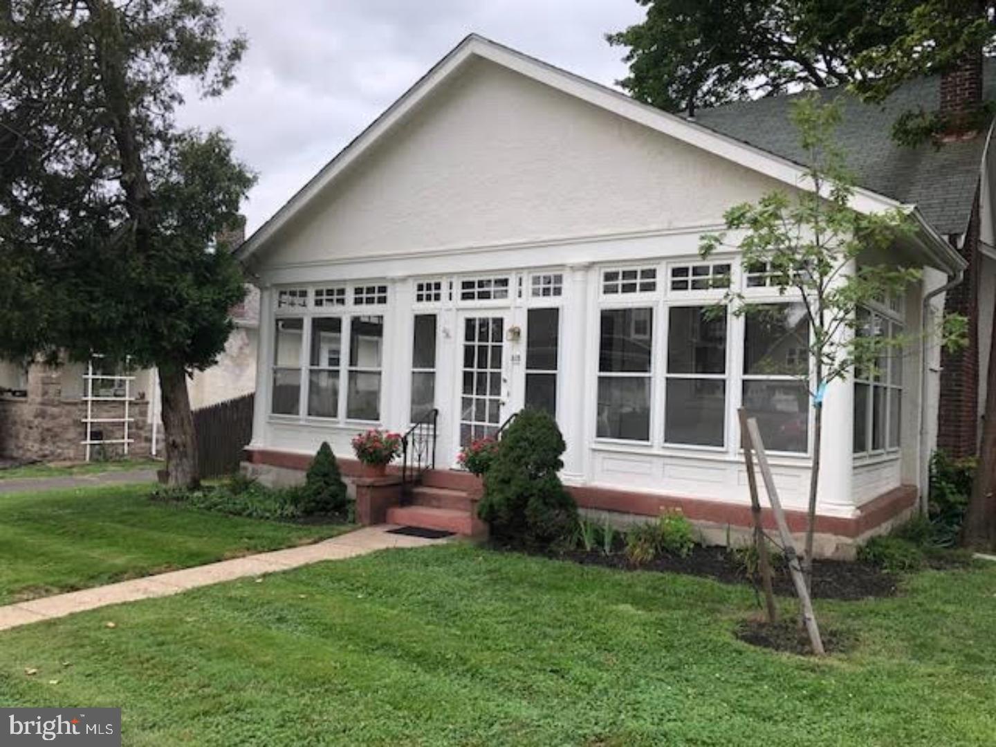 Newly renovated home located in quiet Ambler neighborhood with lots of charm. Walking distance to Septa train, buses, and elementary school. Large rooms with plenty of storage. 4 bedrooms, 2 full baths, eat-in kitchen with newer appliances including new dishwasher; living room, dining room, full basement with washer/dryer hookup, front porch, garage and a large yard. Newer wall-to-wall carpeting, beautiful tile floors and many other upgraded amenities. Usable garage with 2 car parking. Professional lawn care included. Tenant pays all utilities. No smoking. No pets.
