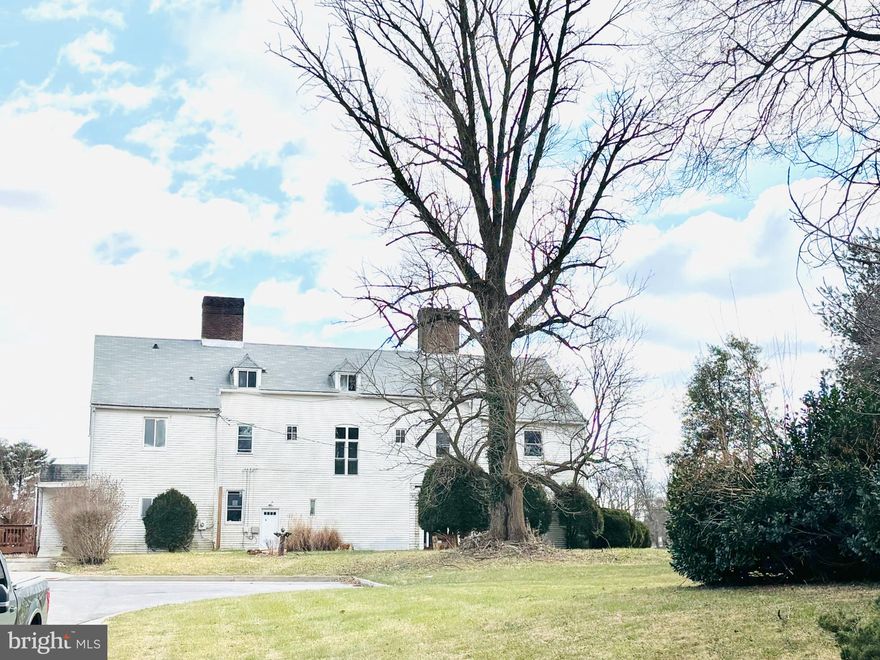 Nestled in the charming Belle Farm Estates, this historical home boasts endless potential. With five spacious bedrooms and six full and a half bathrooms, this residence offers an abundance of space for both relaxation and entertaining, making it the perfect sanctuary for those seeking comfort and style. As you step inside, you are greeted by a grand foyer that sets the tone for the rest of the home. The inviting living areas are adorned with rich brick and shingle siding, showcasing the classic architectural details that define this beautiful property. Imagine cozy evenings spent by one of the six fireplaces, each one a focal point that adds character and warmth to the home. The layout encourages connection and conversation, ensuring that every moment spent here feels special. Large windows invite natural light to dance throughout the rooms, creating a bright and airy atmosphere. The expansive bedrooms provide a peaceful retreat at the end of the day, each offering ample closet space and unique charm. The six full bathrooms ensure that everyone has their own space, making morning routines a breeze. Outside, the property boasts a spacious yard that needs a little tender loving care to transform it into your private oasis. This home is situated at the end of a cul-de-sac with a driveway and on-street parking, providing convenience for you and your guests. While there is no pool, the lush surroundings and spacious lot offer plenty of room for outdoor activities, gardening, or simply enjoying the fresh air. This home is not just a place to live; it's a place to create lasting memories. Whether you're hosting a festive gathering or enjoying a quiet evening by the fire, this residence is designed to meet your every need. With its rich history, elegant design, and ample space, this colonial gem in Belle Farm Estates is ready to welcome you home. Residential Zoned DR 3.5 Units/Acre, this property presents a variety of possibilities. Additionally, with special exception permits, it could accommodate Convalescent Homes, Community Buildings, Class B Group Child Care, Assisted Living Facilities, and Professional Offices (up to 25% of the floor area) All zoning info to be verified with Baltimore County Zoning. This home is being sold As-Is.  Don't miss the opportunity to make this enchanting property your own and experience the comfort and joy it has to offer. Schedule your private tour today and envision the possibilities that await!