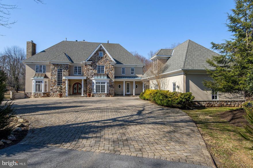 Exceptional custom-built Manor w/Guest House, walking distance to Potomac Village. 5BR/7.5 BA perfect for grand scale entertaining. Exquisite craftsmanship throughout. Mahogany library & living rm w/coiffured ceilings. Warm & inviting FR off gourmet tablespace kitchen. LL w/expansive rec rm & FP, gym, Au-Pair suite. Sprawling garden w/patio & outdoor FP. Five car garage.  Public water and sewer.