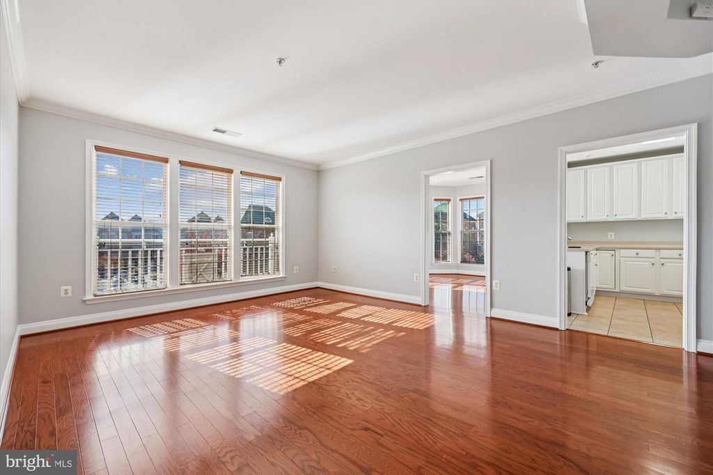 Photo of 802 Grand Champion Drive #11-303, ROCKVILLE, MD 20850 (MLS # MDMC2205844)