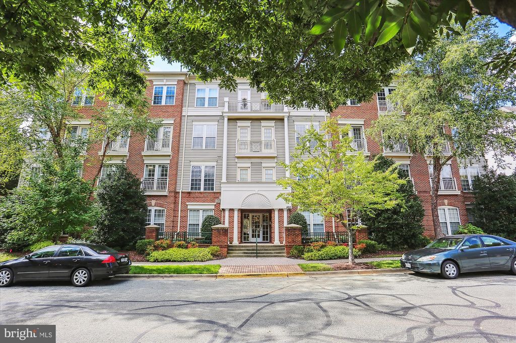 Photo of 802 Grand Champion Drive #11-303, ROCKVILLE, MD 20850 (MLS # MDMC2205844)