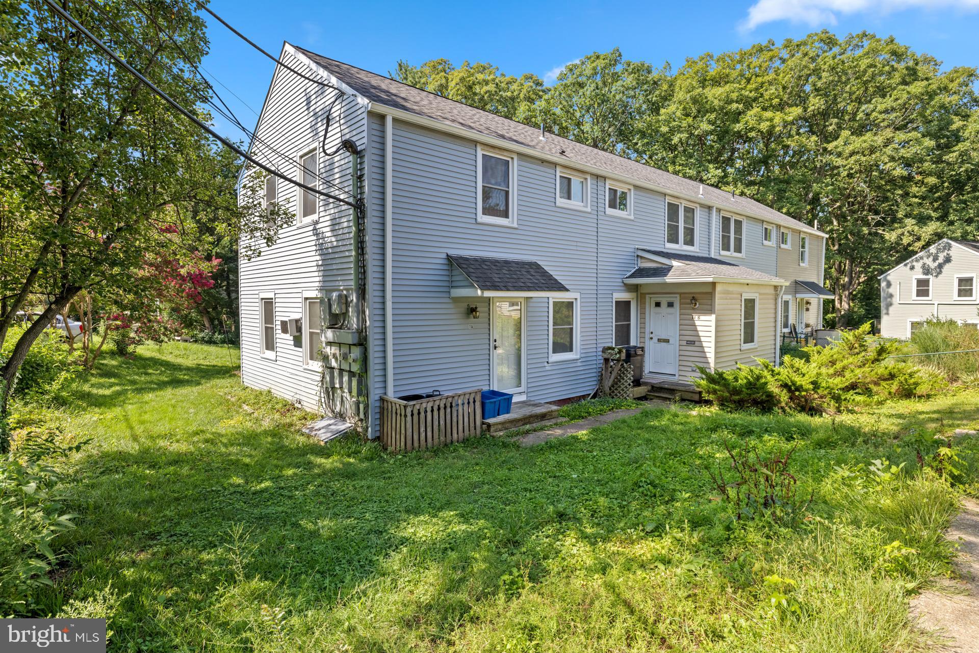 Updated three-bedroom end unit with separate full laundry room and hardwood floors throughout. Modern kitchen with refreshed cabinets, counters, and fixtures, plus a newly updated bathroom. Just a 10-min stroll to Historic Greenbelt’s downtown shops and theater, and 15-min stroll to Buddy Attick Park through the Firefly Sanctuary. The fee covers property tax, insurance, and major exterior/interior maintenance—own your home without ever cleaning gutters! Visit the GHI website for community info. Last photo is virtually staged.