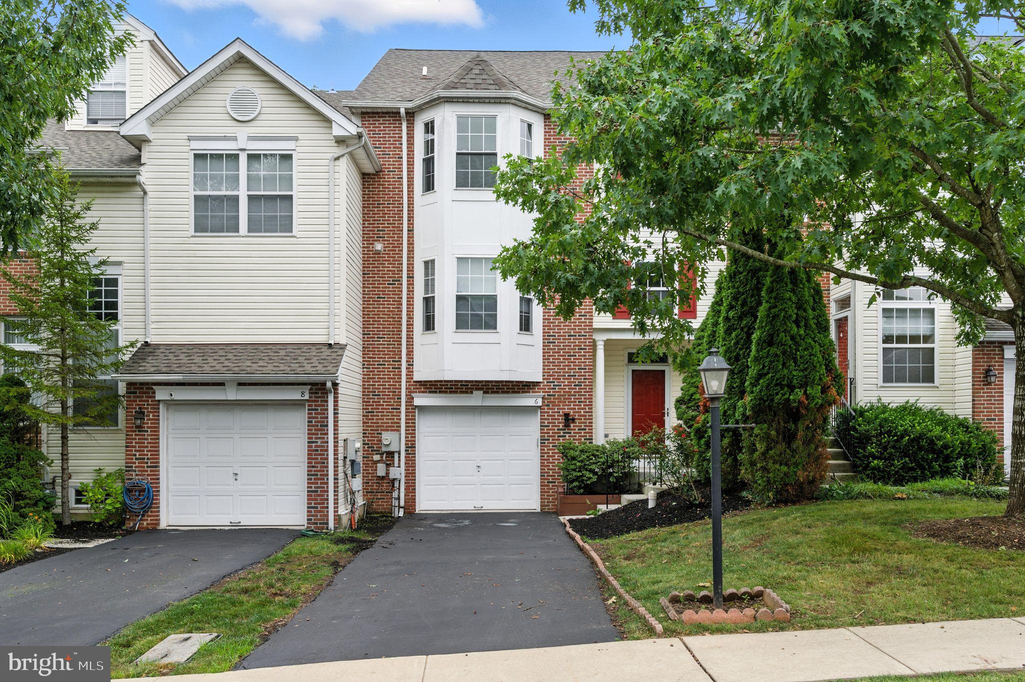 Welcome to 6 Penmore Place – a beautifully maintained townhome with one of the most popular models in the desirable Hunt Club community of Collegeville! The location is on premium cul-de-sac, an ideal location where children can play safely outside. When entering, you are greeted by a soaring foyer ceiling and warm wood floors that carry up the stairs to the living room area on the main floor. The living room has a bright, open layout perfect for everyday comfort and entertaining alike, with a walkout bay window area. The adjacent kitchen has ample cabinetry and plenty of countertop area for meal prep. The appliances are all newer and upgraded to stainless steel (refrigerator 2024, dishwasher 2022, stove and micro hood July 2025). The kitchen has an eat-in area, large enough for a table to seat 6! But going around the corner, don't miss the oversized pantry closet! Great for all those Costco runs! And finishing off this main level is the powder room, tucked back by the pantry closet, private but still convenient! From the kitchen sliding glass door, enjoy the outdoors on your recently stained deck —perfect for summer barbecues or morning coffee. And the home backs up to common space and trees! Making your way to the 2nd floor, you will find a serene primary suite with a walk-in closet and private bath, complete with jacuzzi tub and separate shower. The walk-out bay window is here as well with great windows for natural light. There are two additional bedrooms with ample closets for storage. These are great for children, guests, or make one a home office! The hall bath is shared by these two bedrooms. And for ease and comfort, the laundry room is also located on this second floor. The washer and dryer are remaining and are just one year old! A walkout finished lower level has a large window and sliding glass door, giving access directly to the backyard area. It offers a versatile space ideal for a tv/media room, playroom or a home gym. The built-in garage has space for one car, plus space on the driveway for up to 2 additional cars. Recent updates also include fresh paint throughout (garage will be done prior to settlement), a newer hot water heater (2021), and a newer roof (2022), giving you peace of mind for years to come. Located in the award winning Spring-Ford Area School District, and just minutes from Providence Town Center, walking trails, parks, and commuter routes—this is the ideal place to call home!