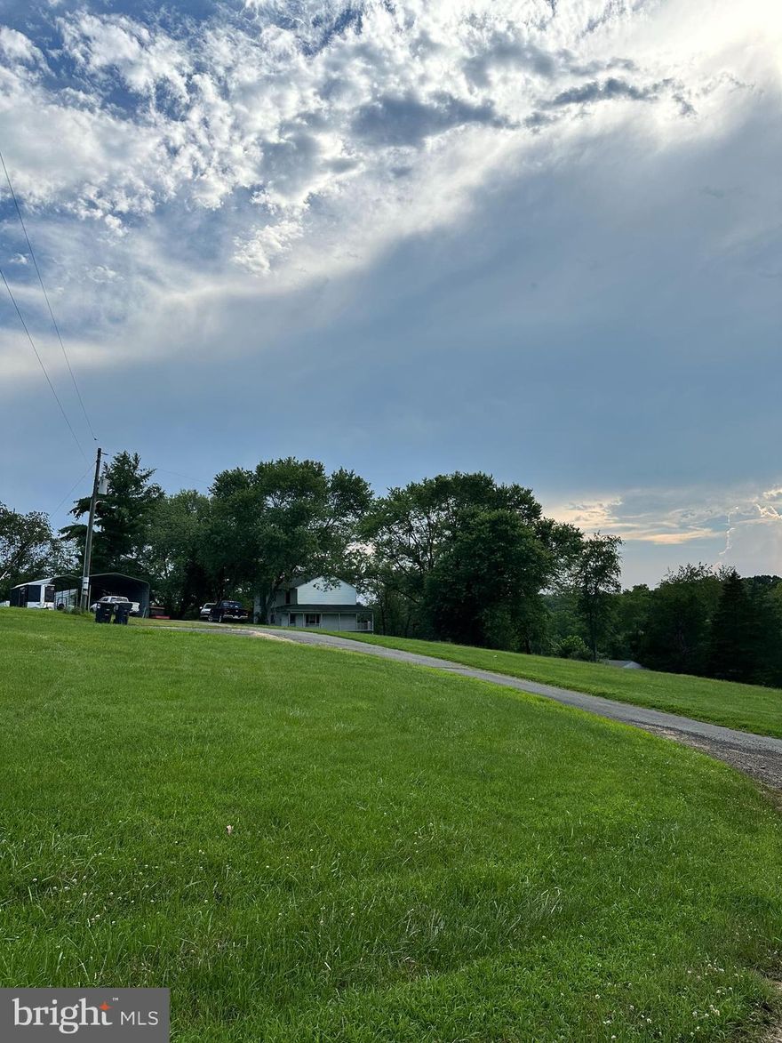 Welcome home to the country. A little over 27 acres of your own pasture. Beautiful sunrises & sunsets. Lots of riding trails besides what's in your own yard. Riding ring, 8 horse stalls and closet for tack & gear, metal pole barn approximately 40 X 80 with stalls. Detached 2 car garage, 10X20 shed,24x40 metal equipment storage building. Interior pictures to come still packing. Sold in as is condition, Generac Generator conveys.