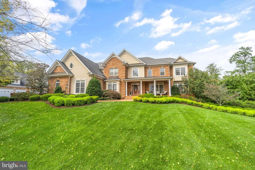 **SEE THE VIRTUAL TOUR FOR A VIDEO** A haven of luxury and comfort nestled in the heart of Winchester. This home offers a standard of luxury while providing privacy and exclusivity in a serene 5-acre setting. As you approach this magnificent property, you are greeted by a paved driveway leading up to a grand brick exterior. The 7 space courtyard garage with a finished loft stands ready to house your automobile collection or storage needs. Inside, the home spans over 8,500 finished sq. ft., offering six bedrooms and six bathrooms, each one a testament to elegance and comfort. The open floor plan is accentuated by hardwood floors that flow seamlessly across the main and upper levels, leading you through a gourmet kitchen, a sun filled combination dining and formal living room, and a two-story family room. The heart of the home, the kitchen, is a culinary enthusiast's dream. Off the kitchen is the outdoor deck which leads to the pool and is a wonderful space for morning coffee or your beverage of choice. The family room, with its wood-burning fireplace, wall to wall windows, adds a warm, inviting ambiance to the home. The spacious master bedroom, complete with a luxurious ensuite bathroom, walk-in closet and sitting area, provides a private sanctuary. The basement is an entertainer's dream. It includes a fireplace, a bar, a gym, a game room, and additional bedroom space. All designed to cater to your entertainment and fitness needs. The walk-out basement allows for access to a heated pool, surrounded by pristine landscaping, providing the perfect setting for hosting summer soirees or enjoying a quiet swim under the stars. Above the four car detached garage, a loft awaits, offering a versatile space that can be personalized to your needs, whether it be a home office, an art studio, or a guest suite. This home's unique architectural features and high-end amenities will not disappoint.