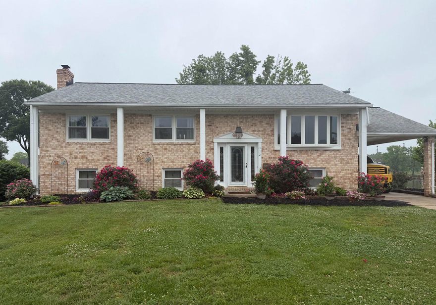 Motivated Seller-Make your waterfront dream a reality! Welcome to this stunning 4-bedroom, 3-bath brick home on Rumsey Island, offering breathtaking water views and exceptional indoor-outdoor living. Designed with an open-concept layout on both the main level and fully finished lower level, this home is perfect for relaxing and entertaining. The beautifully crafted sunroom features cathedral ceilings and panoramic views of the water, filling the space with natural light and serenity. Step outside to enjoy 112 feet of prime waterfront, complete with a private 35-foot dock equipped with electric and water—ideal for boating enthusiasts. Multiple outdoor spaces, including two decks, a patio, and a charming gazebo, provide the perfect setting for gatherings or quiet moments by the water. The finished lower level adds incredible versatility with a cozy fireplace, wet bar, additional bedroom, full bath, and walk-out access to the backyard and waterfront. This pet-friendly home also includes thoughtful features like multiple doggie doors and a fenced area in back.  Additional highlights include stainless steel appliances, built-in lighting throughout, fruit trees, a new bulkhead, tankless water heater, and new fencing for added privacy. With endless amenities and a setting that feels like a private retreat, this is a rare opportunity to own your own piece of waterfront paradise.