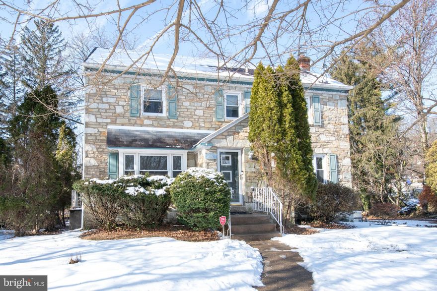 Welcome to 7820 Haines Road, a charming stone and brick Colonial on a spacious, nearly half-acre corner lot in Cheltenham. This move-in ready home offers timeless curb appeal, a long driveway with ample off-street parking, and a generous yard.

Recent updates include a new furnace and central air (2024), one-year-old water heater, new granite kitchen countertops, and a new stove and refrigerator (Jan 2026). 

Inside, enjoy a welcoming foyer with a bright living room and formal dining room, both featuring hardwood floors and large front-facing windows. The updated kitchen features granite countertops, marble flooring, and new appliances.

Upstairs offers three well-sized bedrooms and two full baths, plus a clean, carpeted attic space with pull-down stairs. The finished lower level includes a flexible bonus room, laundry area, and half bath. Garage converted to storage with interior access.

Set on a large corner lot, this home blends classic Colonial charm with thoughtful updates and everyday practicality.