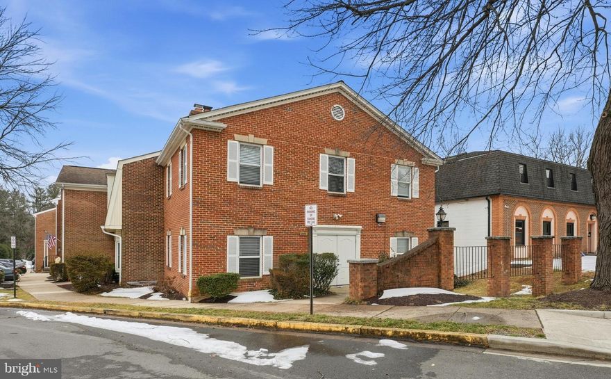 Prime end-unit townhouse office condo with excellent visibility along Route 236 (Main Street). This three-level commercial space is configured into multiple private offices, making it ideal for professional, medical, or small business use.
The main level features a conference room or executive office with a fireplace, creating a comfortable and professional environment for clients and staff. The lower level includes an additional office, kitchenette, and finished storage area, providing functional workspace flexibility.
Property offers one full bathroom and one half bath, low condo fees, minimal annual taxes, and ample free parking. Conveniently located near Downtown Fairfax City with easy access to the Capital Beltway (I-495) just 3.5 miles away.