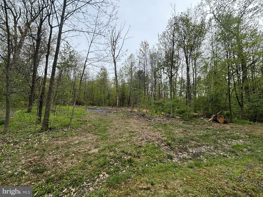 A beautiful and private 2.59 acre building lot located just a 5-minute drive to State College. Choose your own builder. Lot has access public Water & Sewer.