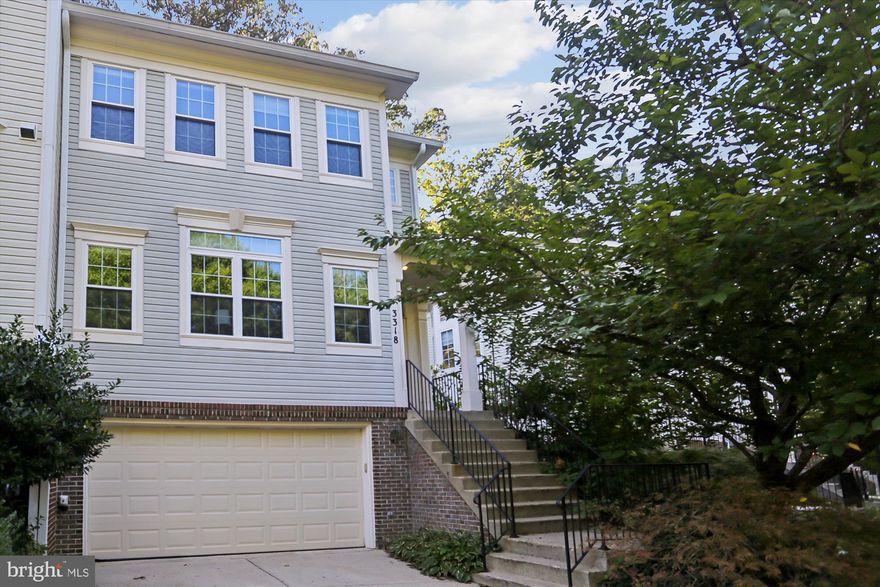 Welcome to this stunning and private high-end townhome with a two-car garage, nestled in a peaceful enclave within the desirable Kensington Crossing neighborhood. This beauty offers approximately 2,300 square feet of living space, a rear deck, and green space both in front and behind the home.  A kaleidoscope of windows fills the interior with natural light, and the laundry is conveniently located on the upper level.  The first-floor features custom built-ins, a cozy gas fireplace, elegant crown moldings, and gorgeous hardwood floors that continue onto the second level. The kitchen and breakfast room combination provides a versatile space for family and guests, with a well-appointed kitchen that includes stainless steel appliances, a double oven with five burners, and ample room for meal prep and socializing.
The spacious and bright primary bedroom boasts custom built-ins, a walk-in closet, and an en-suite bathroom with a separate tub and shower. The lower-level recreation room offers a flexible space with plenty of room for relaxation or play.  This home is ideally located just minutes from the Metro, MARC Train, Antique Row, shopping, and restaurants.