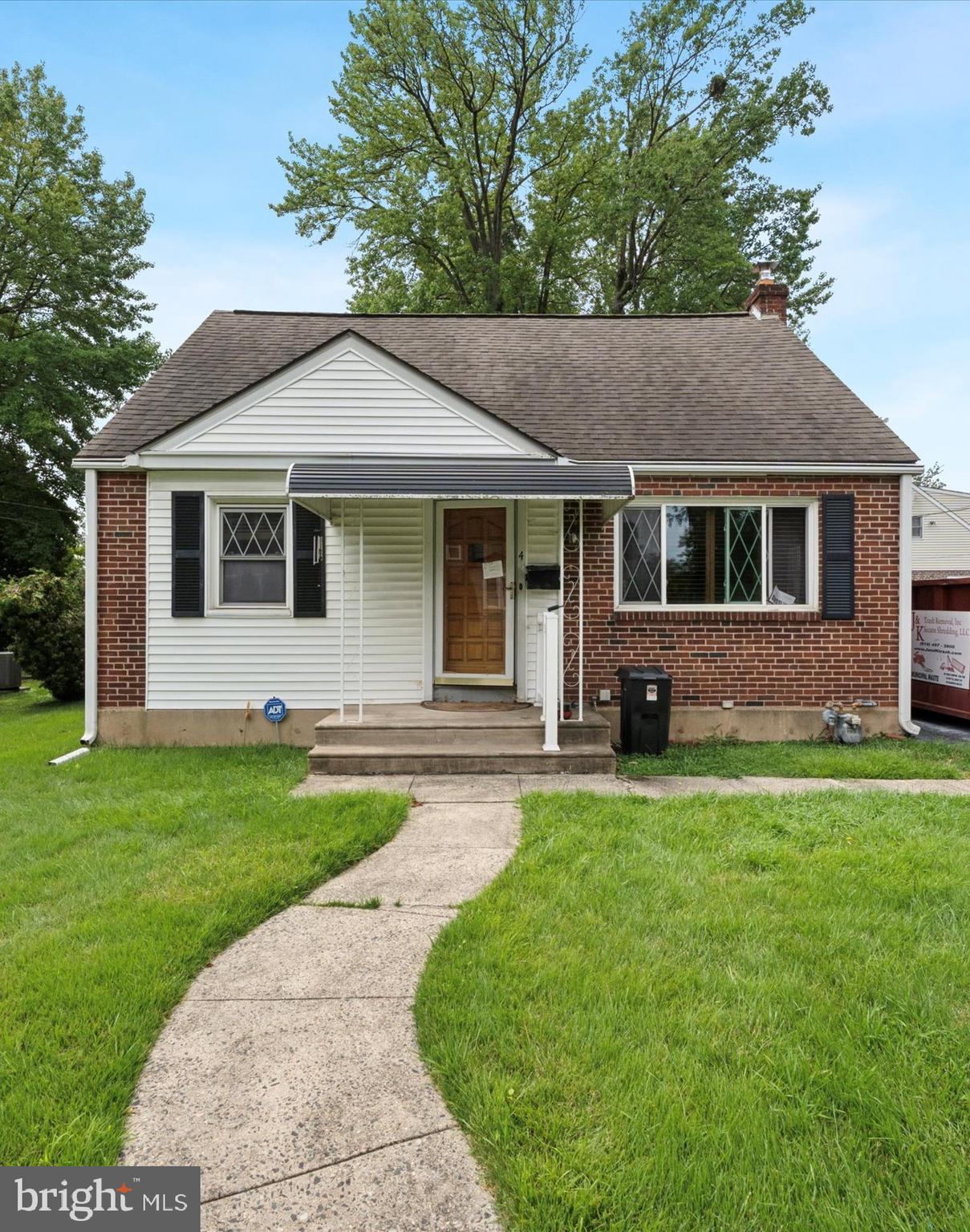 Nestled in a quaint section of Aldan Boro, this darling 3BR/1.5BA Cape offers a great deal of square footage and living space. As you walk up your driveway, you till notice the landscaping adorning the front yard and brick-front facade. Inside the front door, you are met bay a spacious living room with stunning hard wood floors that carry into the amply sized dining room. Off to the left of the dining room is a spacious kitchen complete with newer laminate floors. There is an extension off the back of the house that can be used to just sit and relax or a multi-purpose room. Before you head upstairs, there is a full sized bedroom complete with closet and half bathroom. Upstairs you are met by two nice-sized rooms with plenty of storage and closet space along with a tiled full bath . The basement boasts plenty of space and is finished. Out back is a great yard, perfect for entertaining along with a full shed with electrical. Close to major highways, shopping, restaurants and public transportation, unpack your bags and move right int!