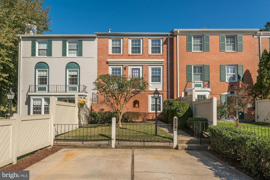 Gorgeous renovated townhome flooded w/ natural light! 2 off-street parking spaces in front! Hardwood floors, granite counters, ss appliances, loads storage space, built-in bookshelves, pull down attic for storage! Huge family room, office, full bath on lower level. Large brick patio in back. Community pools, playgrounds, beautiful lake and walking trails. Offers if any due Mon 10/24 @ 5:00.