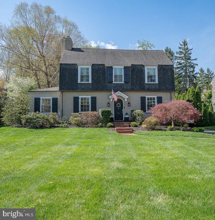 Welcome to 516 Brookside Avenue — a classic 3-story Colonial near the heart of Wayne, blending historic charm with thoughtful modern updates. Built in 1925 and offering 3,638 square feet of beautifully maintained living space, this 4-bedroom, 2.5-bath home is in excellent condition and is move-in ready. 
The centerpiece of the home is the new designer kitchen, featuring ZLINE appliances, an induction stove, dolomite honed marble countertops and full height backsplash, with a large island with convenient seating. Between the kitchen and living room is an attractive Butler’s Pantry with custom cabinetry and a wet bar - perfect for everyday living and entertaining.  The spacious family room is adjacent to the kitchen and features a gas fireplace and French Doors leading to a flagstone patio and a beautifully landscaped yard. The elegant dining room is complimented by a fireplace and French Doors that lead to the enclosed sunroom which also has a fireplace. A rear mudroom off the kitchen offers the convenience of an enclosed laundry area, custom cubbies and a coat closet as well as a door leading to the driveway and detached garage.  
The second floor includes the primary bedroom with a beautiful private bathroom.  Three other bedrooms share another newer bathroom.  The finished third floor is perfect for a home office as well as an additional family/rec room area.  Classic architectural details, custom wainscoting, new paint throughout, with gleaming hardwood floors, and sunlit rooms enhance the timeless appeal of this beautiful home which is walkable to the shops, restaurants, in downtown Wayne and St. David’s train station.
Don't miss this rare opportunity to own a piece of Main Line history with all the modern comforts!