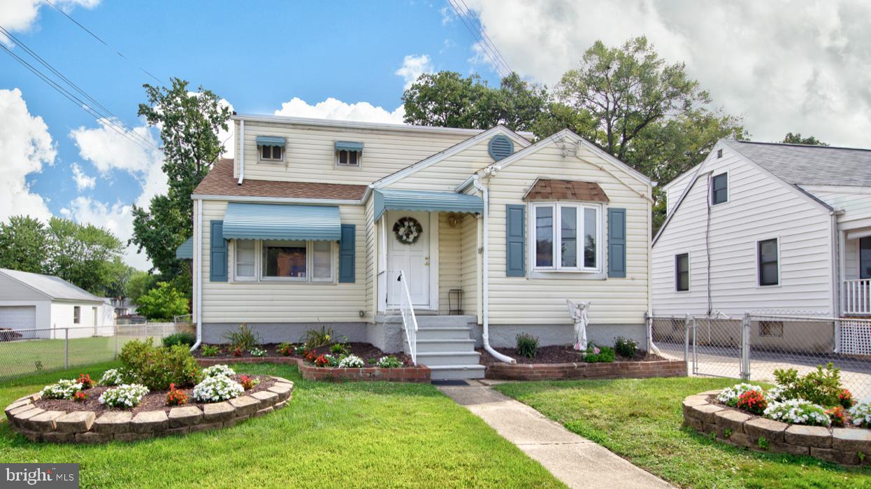 New Price Improvement!! ***Beautifully updated and well maintained home with over 2,500 Finished sq. ft. No HOA, 3 beds, 2 & 1/2 baths, 1 YEAR HOME WARRANTY, Main Level-- Gourmet kitchen, Large living room w/ hardwood, 1st fl. Bedroom, New full bathroom, Den, Huge Florida Sunroom 30 X 16. Lower Level-- Great Room perfect for entertaining your guest and has a custom built bar, & newly updated 1/2 bath, fresh paint through, all new carpet, all new ceiling fans throughout, recessed lighting, sep laundry room w/sanitary sink, storage & outside access to side yard. Upper Level has 2 bedrooms and an updated full bathroom. The outside area has 2 porches 1 at front entrance, and 2nd is at the side entrance of house and has plenty of storage underneath, Huge rear fenced yard (for all your outside entertaining needs), 2 car parking pad for off street parking, Fenced front yard w/all New Landscaping. Close to I-95, Rte.695, shopping, malls, dinning. New Roof 2017..MOVE IN READY.. Welcome Home..