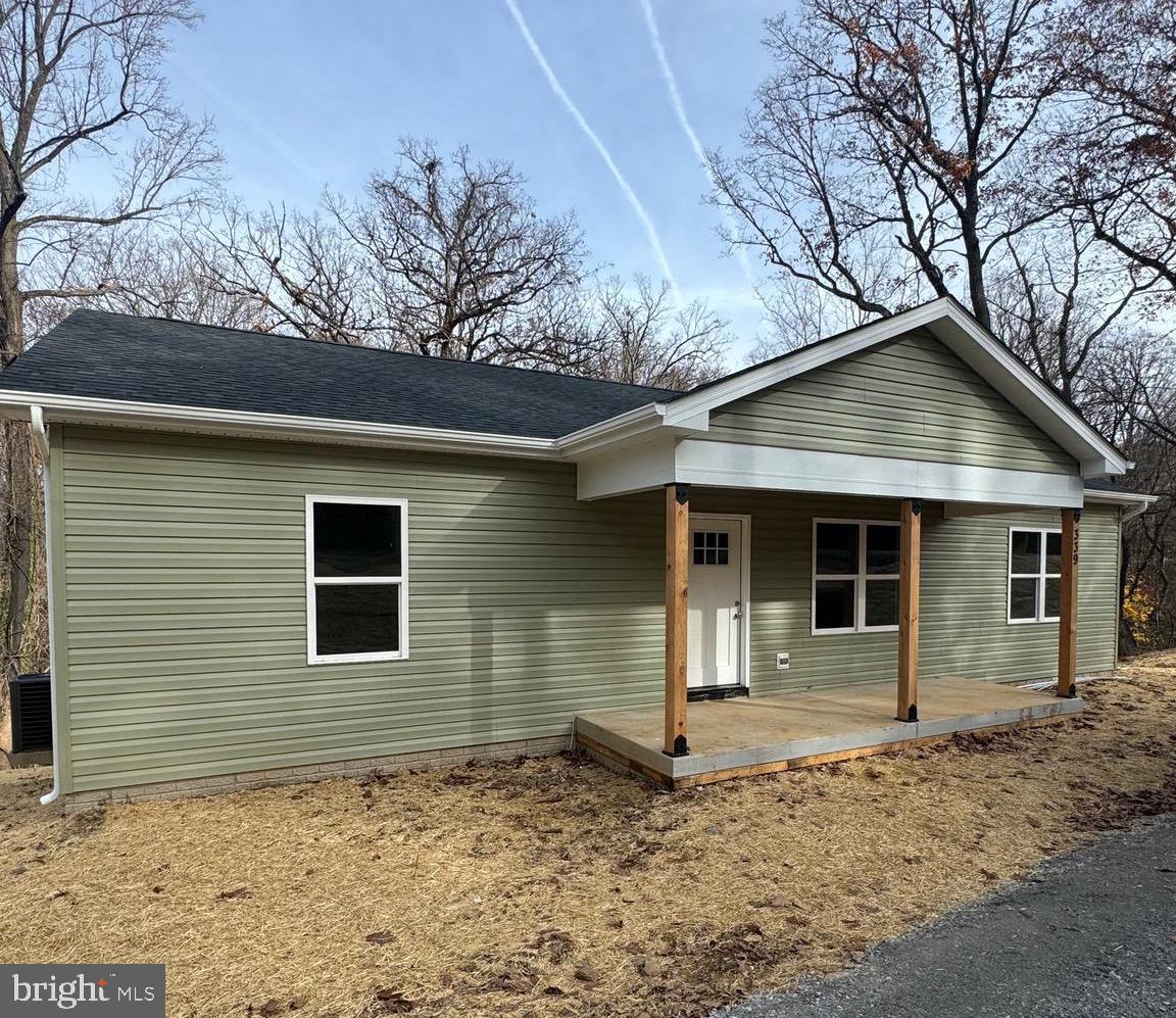 Welcome home to this almost completed new construction rancher - 327 Red Bird Ln, Harpers Ferry WV!! Main Level Living at its finest - In the heart of the home you'll be greeted by Vaulted Ceilings+ LVP Flooring throughout the Open Family Room flowing into Beautiful Kitchen w/ Island and table space, on one side of the home you'll find the Primary Suite with walk in closet, en suite full bathroom with tub shower combo and linen closet; On the other side of the home are 2 nicely appointed bedrooms and Full bath. Bonus to this home is the laundry room is located on the main level! Lower spacious walk out basement offering additional space, and storage. High Speed Internet! No HOA! Great location, low maintenance home, low taxes! Easy access to Virginia and Maryland. Close to an arrange of community actives / amenities - Mountain Lake Club and Beach , River Country Store, Shannondale Springs Trails, Mount Mission Park; as well as stopping, entertainment, history, nature an so much more! *** photo show alike fixtures and finishes for the home